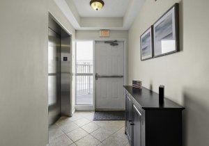 41-hallway-exterior-elevator-and-pool-entrance.jpg
